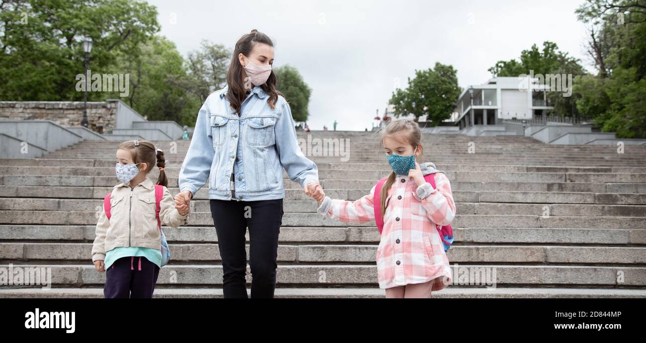 Back to school . Coronavirus pandemic children go to school in masks ...