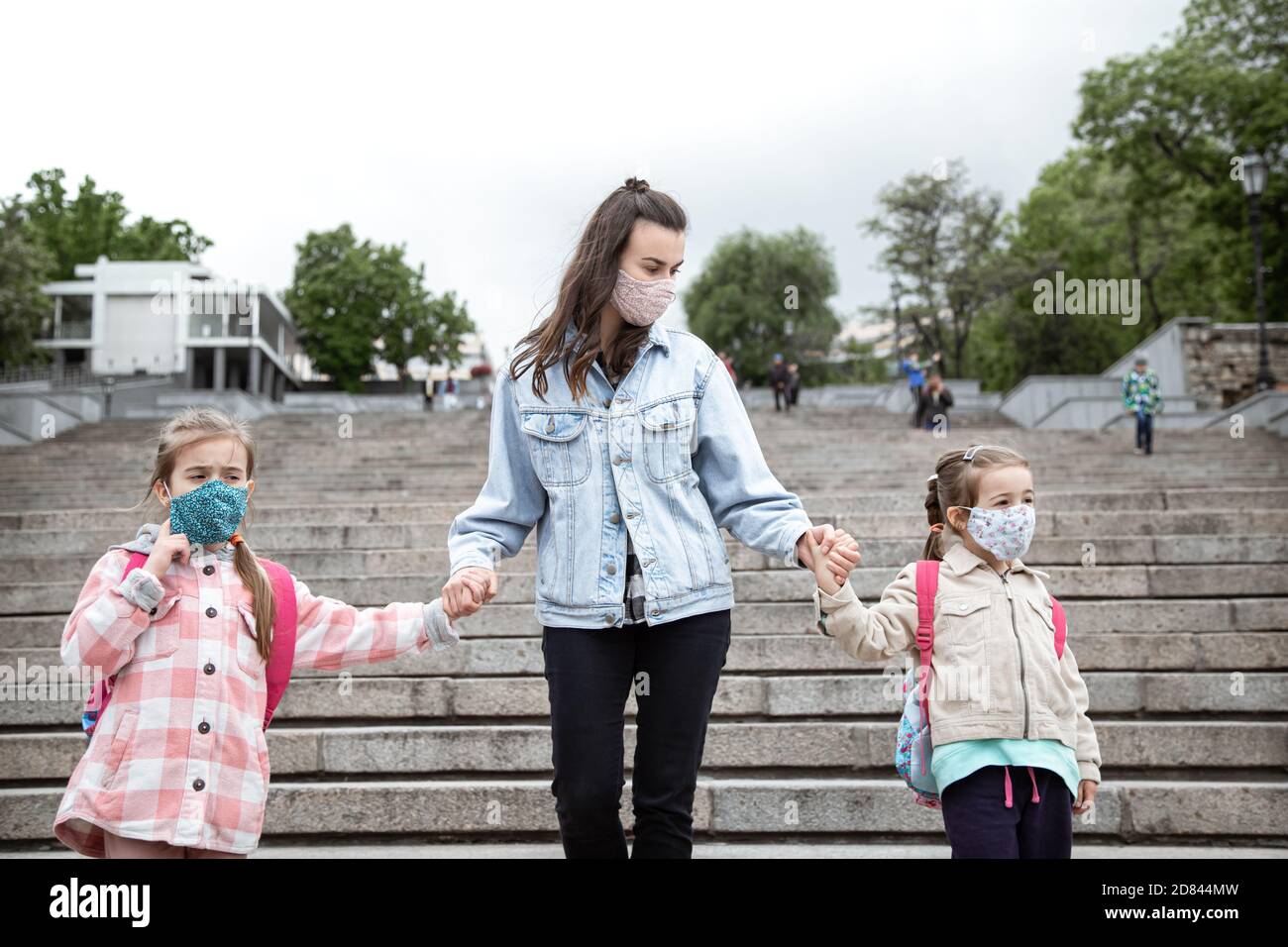 Back to school . Coronavirus pandemic children go to school in masks ...
