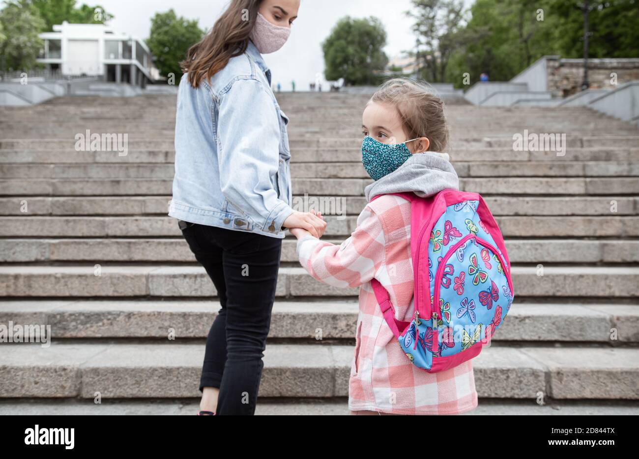 Back to school . Coronavirus pandemic children go to school in masks ...