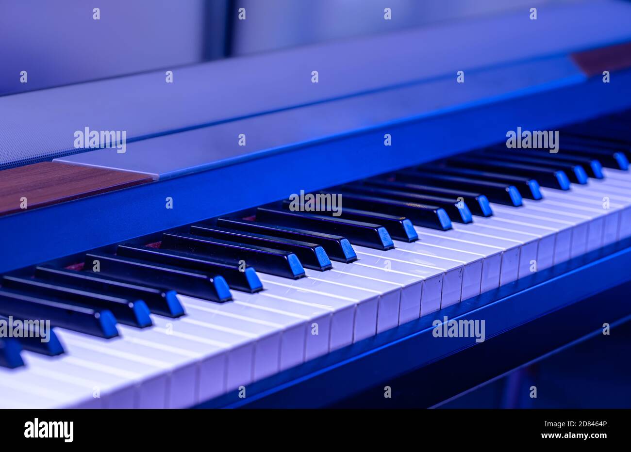 Piano keys on a beautiful colored background. Close up Stock Photo - Alamy