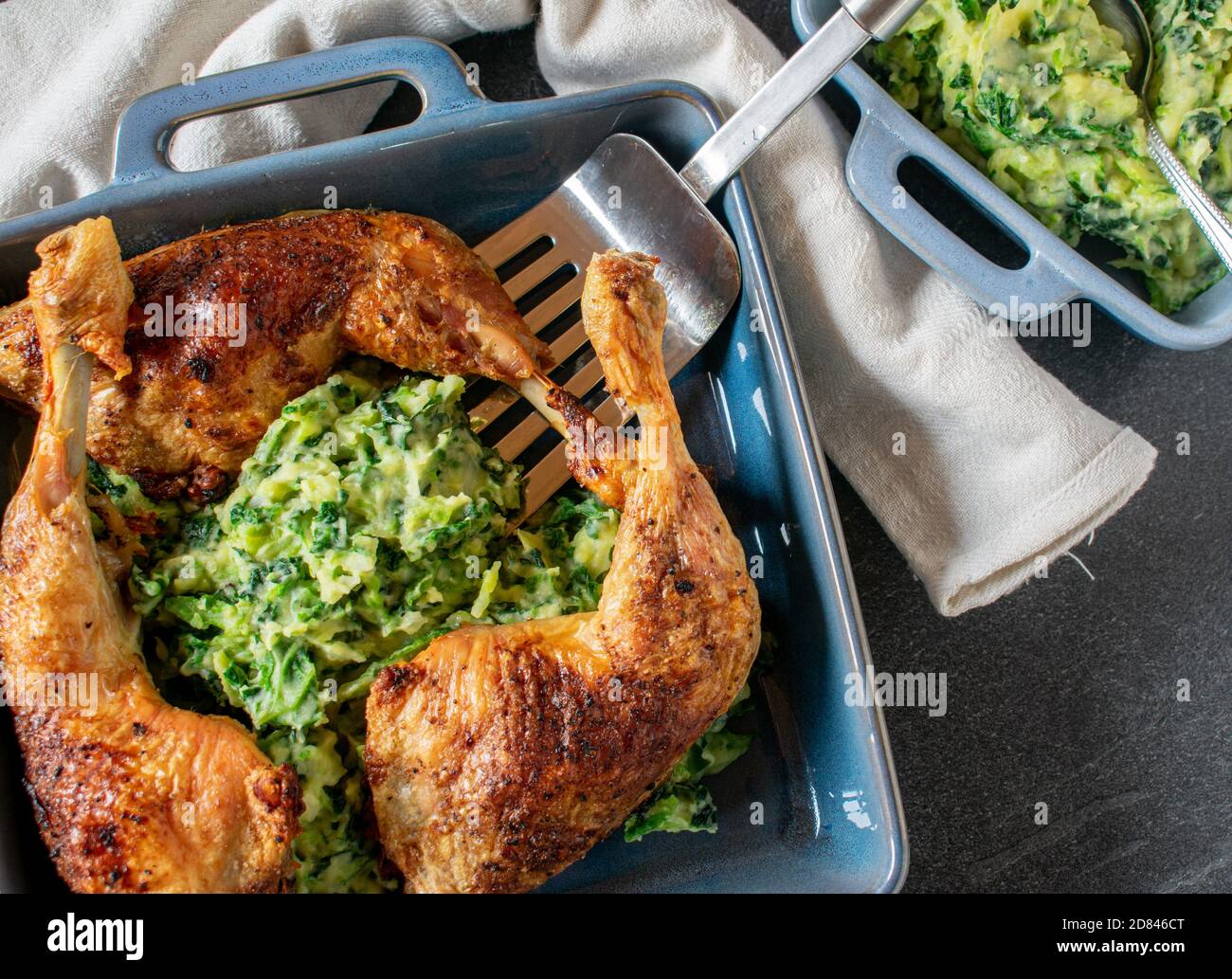 roasted chicken legs with potatoes and vegetables Stock Photo Alamy