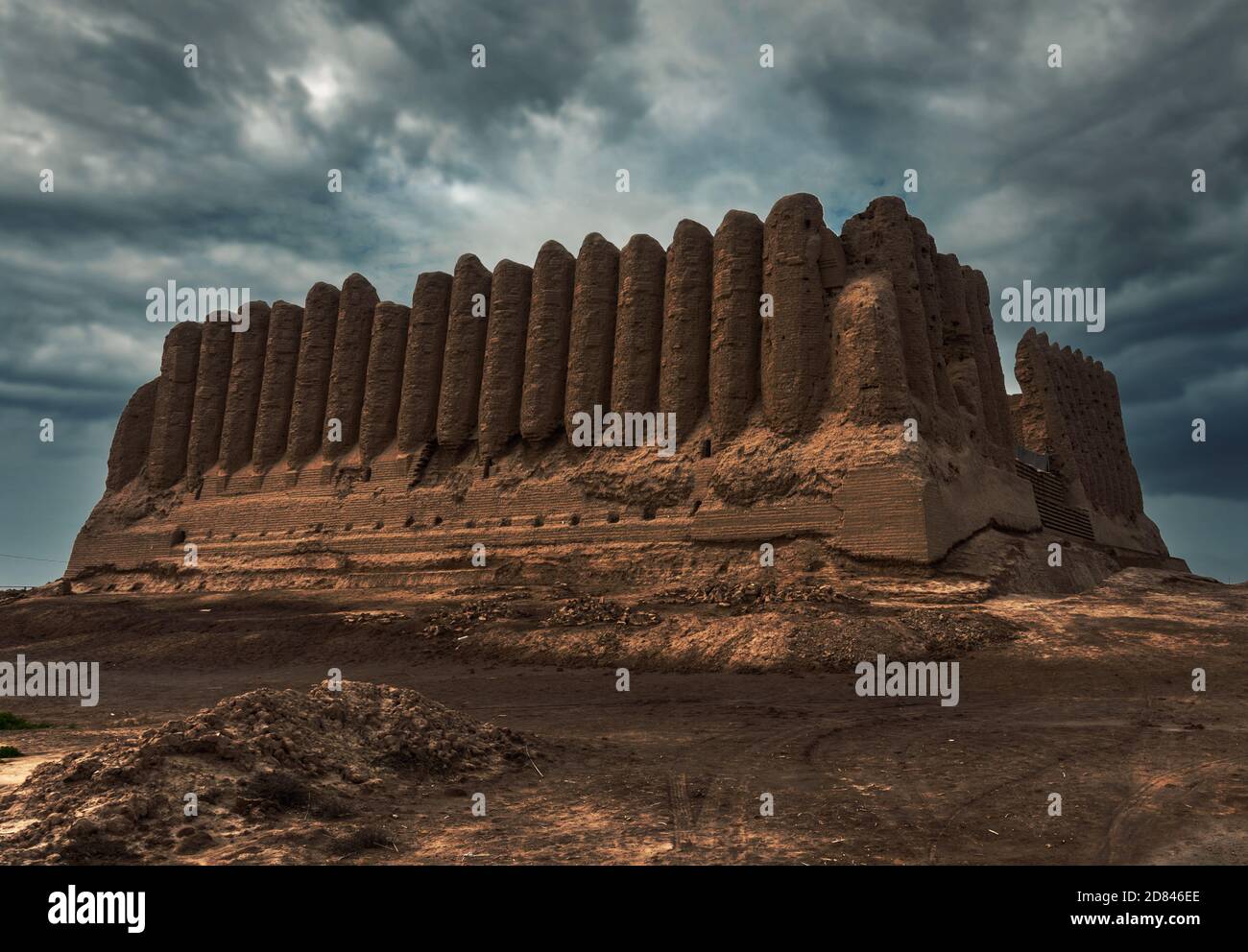 Great Gyz Gala (maidens castle) in an overcast day with stormy clouds hovering above the fortress, located in Mary, Turkmenistan. Stock Photo