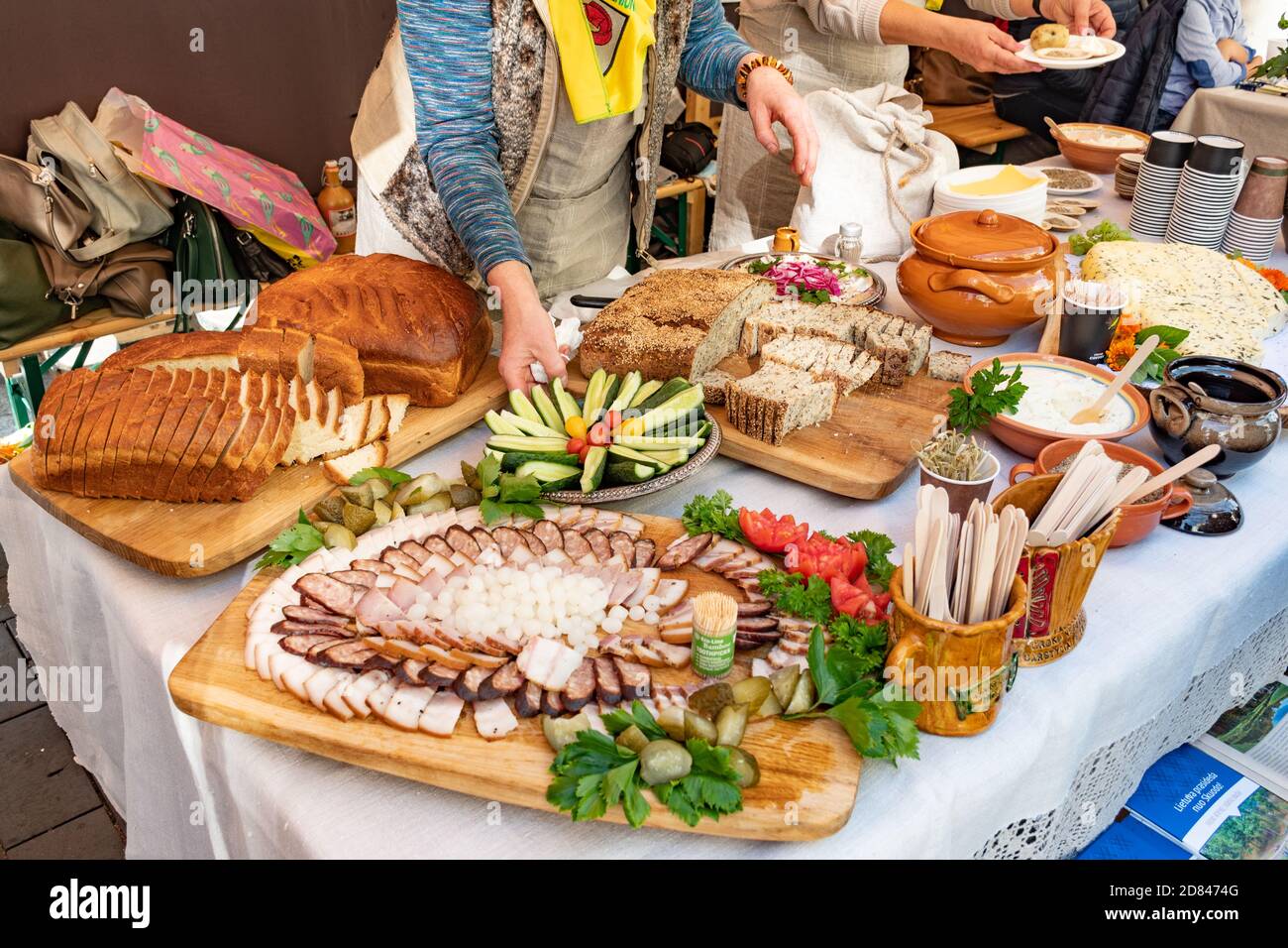 Table filled with starters, appetizers and snacks, food for a feast  celebration, Lithuanian or Northern Europe or Baltic food Stock Photo -  Alamy