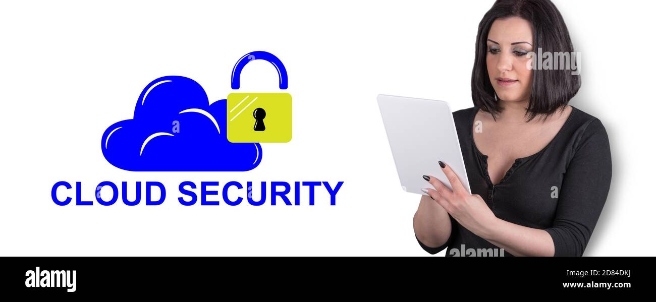 Woman using digital tablet with cloud security concept on background Stock Photo