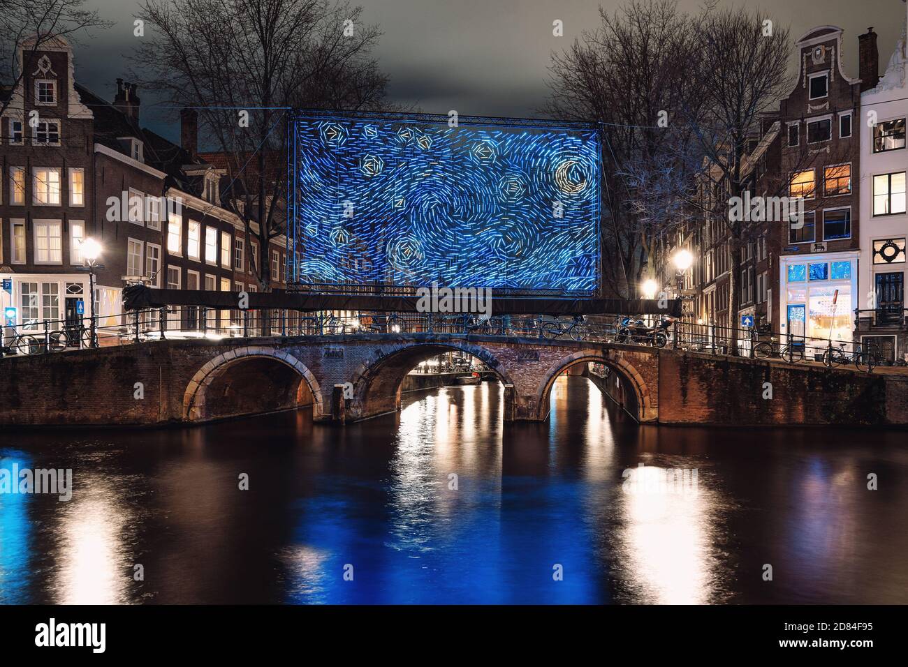 Amsterdam, Netherlands - January 14, 2019: Light Festival Amsterdam, giant  blue light object placed on a bridge over the Herengracht in the old town o  Stock Photo - Alamy