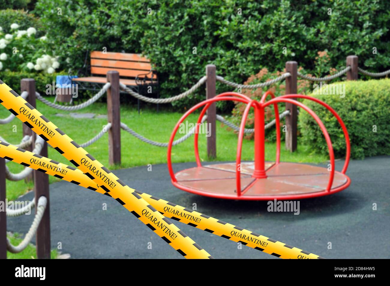 Barrier tape - quarantine. The playground is closed. There are no children in the playground in the yard. Prevention of coronavirus COVID-19. Stock Photo