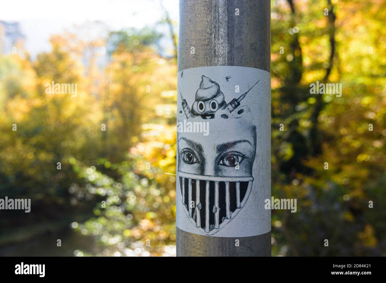 Heiligenkreuz: sticker at lamp post against vaccination against Covid 19 virus, Wienerwald, Vienna Woods, Niederösterreich, Lower Austria, Austria Stock Photo
