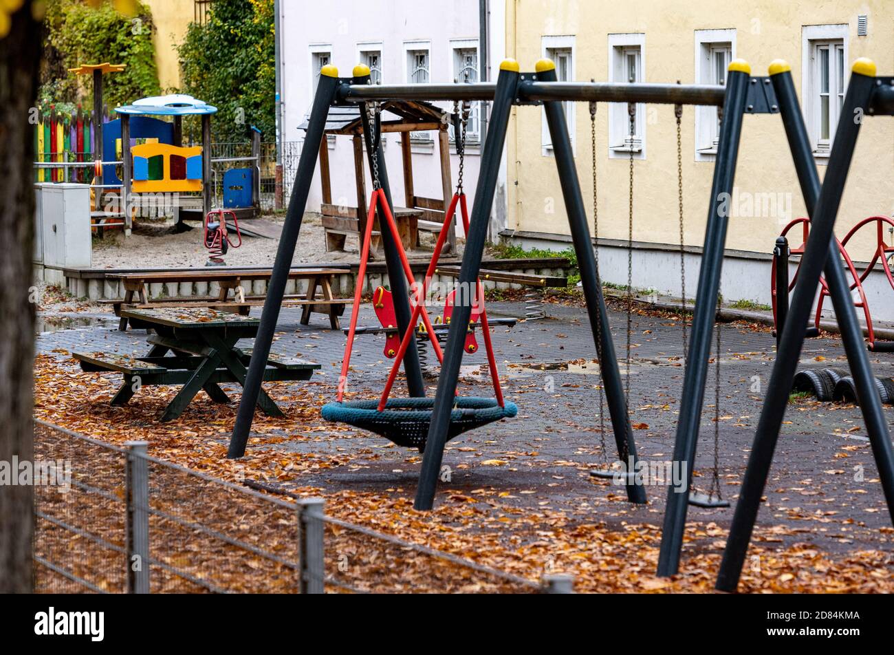 Pfarrkirchen, Germany. 27th Oct, 2020. Menschenleer is a playground in front of a child crèche in the city centre. In view of extremely increased corona numbers, strict exit restrictions now apply in the Lower Bavarian district of Rottal-Inn. Credit: Armin Weigel/dpa/Alamy Live News Stock Photo