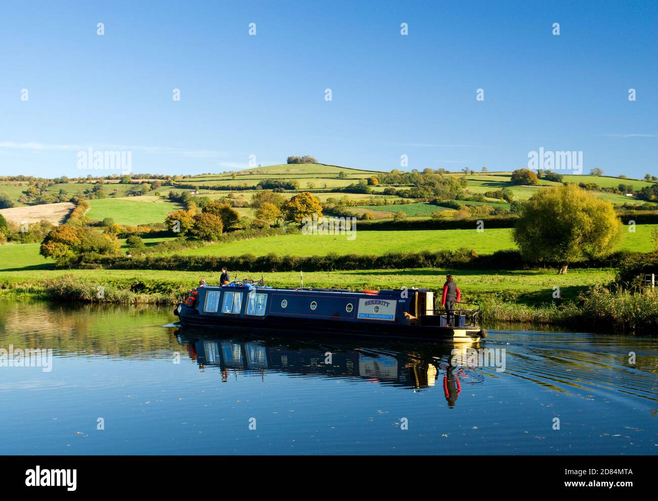 Narrow boat on River Avon from Mead Lane, Saltford with Kelston Hill in the distance, Bath, Somerset. Stock Photo