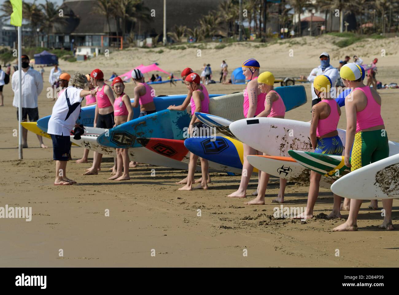 Young boys at start line of surf lifesaving competition, youth sport