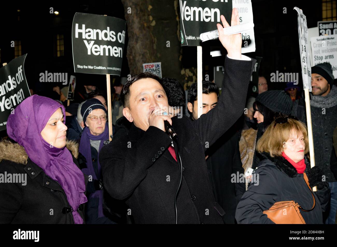 Downing Street, London, United Kingdom, 07th March 2018:- Unknown Protester addresses the crowd outside Downing Street against the visit to the UK by Stock Photo