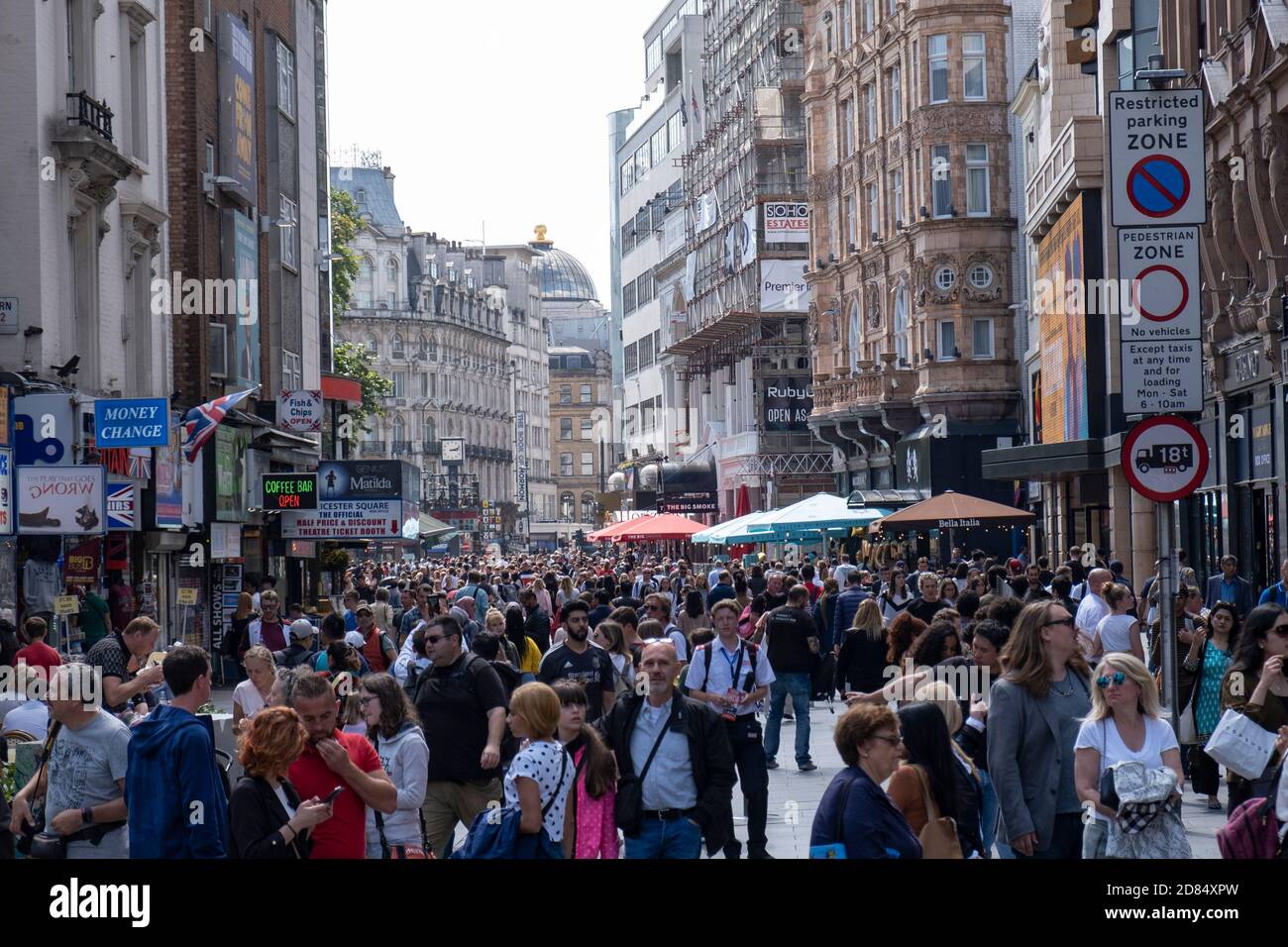 Tourists in a Pedestrian Zone near Leicester Square in London, England Stock Photo