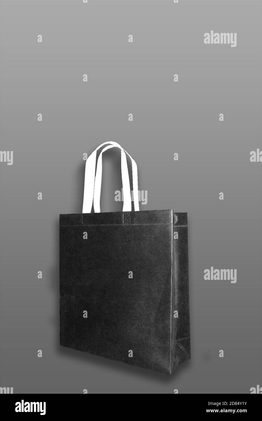 https://c8.alamy.com/comp/2D84Y1Y/eco-friendly-empty-bag-on-black-background-with-copy-space-for-text-and-logo-mockup-bags-2D84Y1Y.jpg