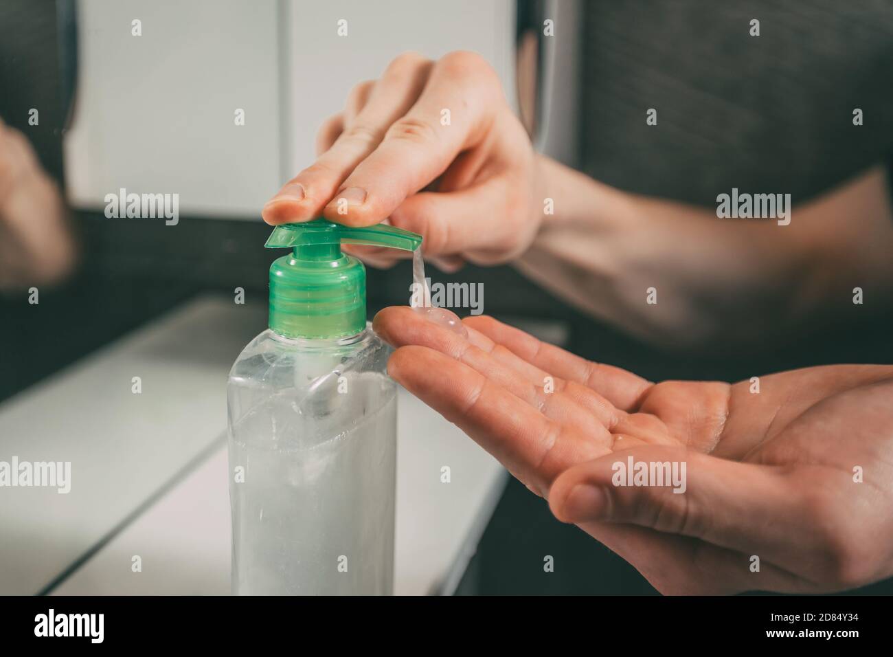 close up. a young man washes his hands with soap. Stock Photo