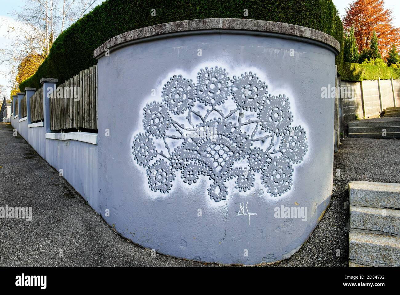 Spray painted wall by Polish artist NeSpoon by Rue Alexis-Marie-Piaget 7 in Le Locle town. Le Locle District in the Canton of Neuchâtel in Switzerland Stock Photo