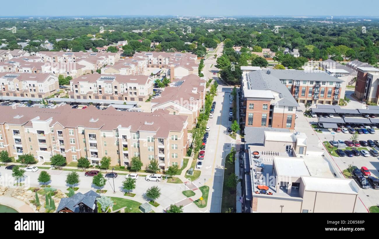 Aerial view multistory apartment complex and suburban residential area