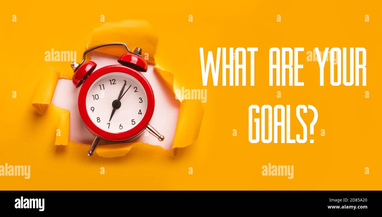 What Are Your Goals Text And AlarmClock On Yellow Background Stock