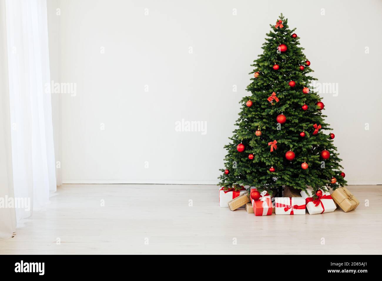 Christmas Tree With Gift Decor For The New Year 2022 Holiday Winter Place For Inscription Stock Photo - Alamy