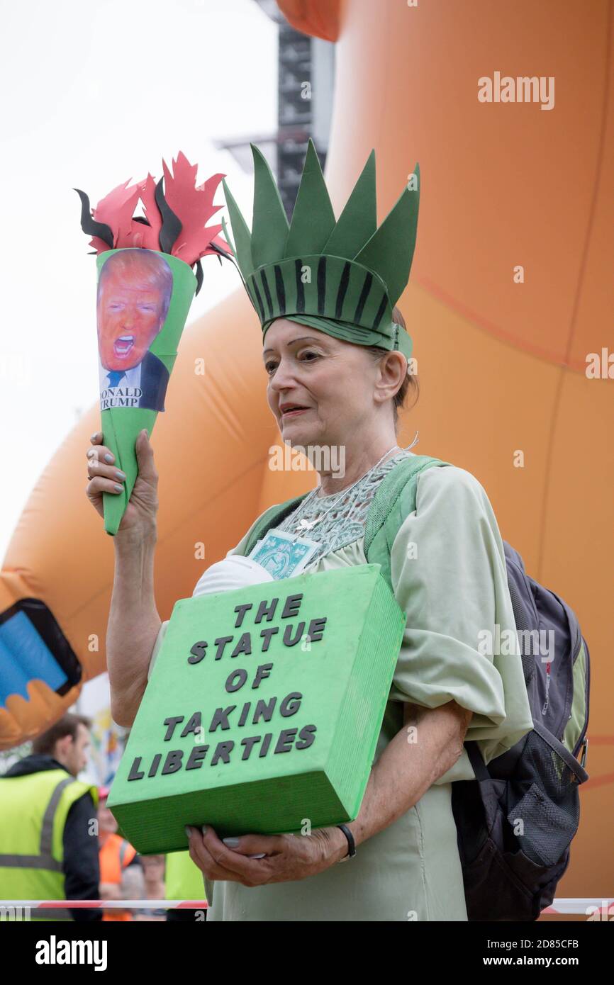 London, United Kingdom, June 4th 2019:- Auriel Glanville, member of Friends of The Earth protesting against Climate Change infront of the Trump Baby B Stock Photo