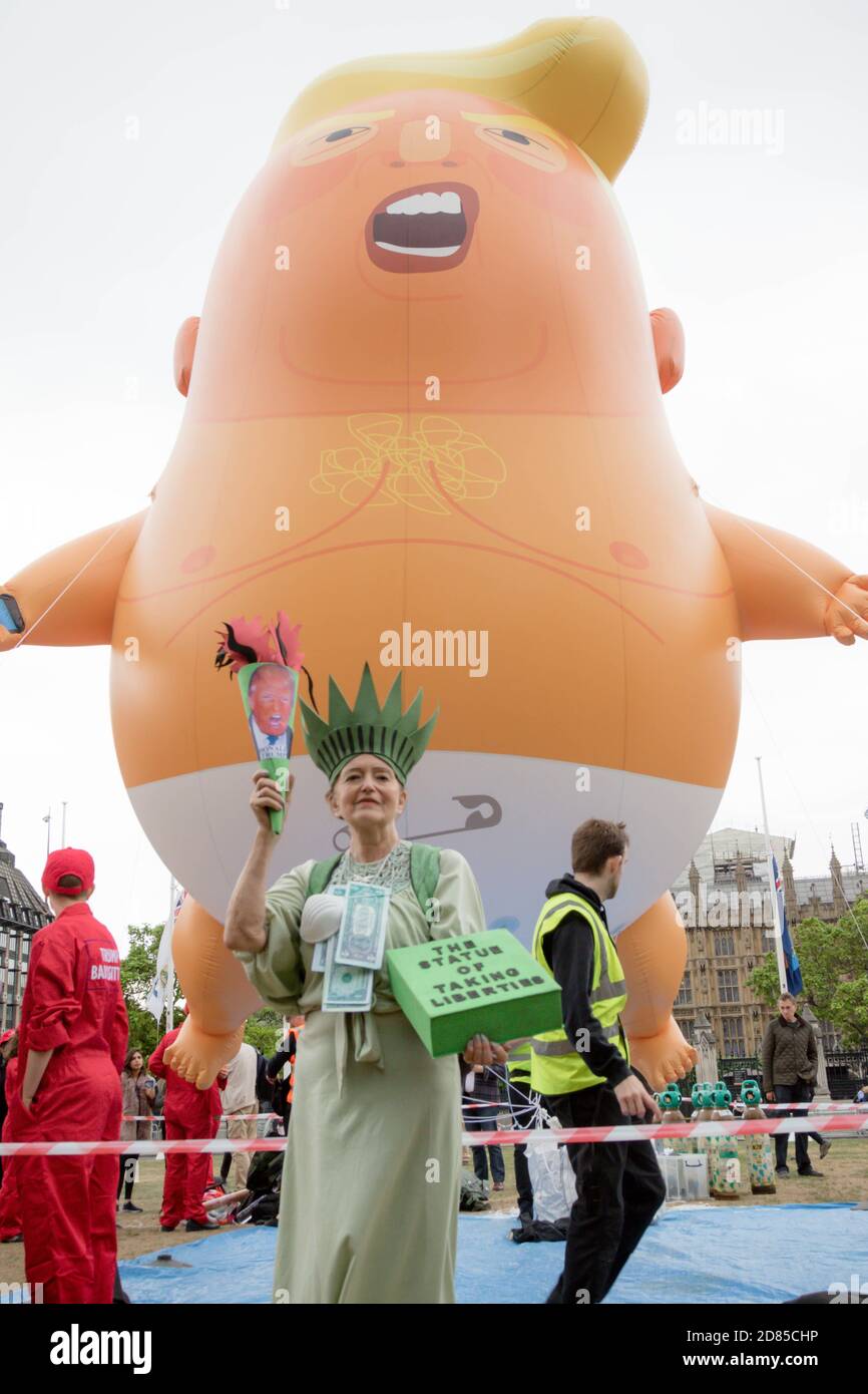 London, United Kingdom, June 4th 2019:- Auriel Glanville, member of Friends of The Earth protesting against Climate Change infront of the Trump Baby B Stock Photo