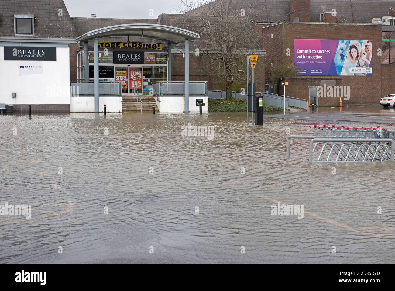 The Sainsbury's and Beales car park in Tonbridge, UK flooded following heavy rain and overtopping of the River Medway that runs through the town Stock Photo