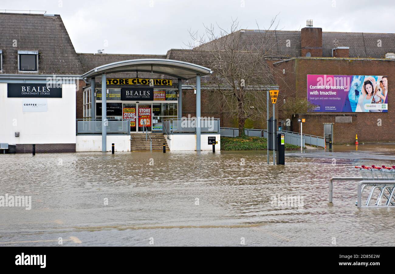 The Sainsbury's and Beales car park in Tonbridge, UK flooded following heavy rain and overtopping of the River Medway that runs through the town Stock Photo