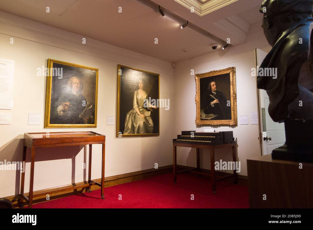 Paintings and artwork hung around the stairs / staircase and landings of the inside the