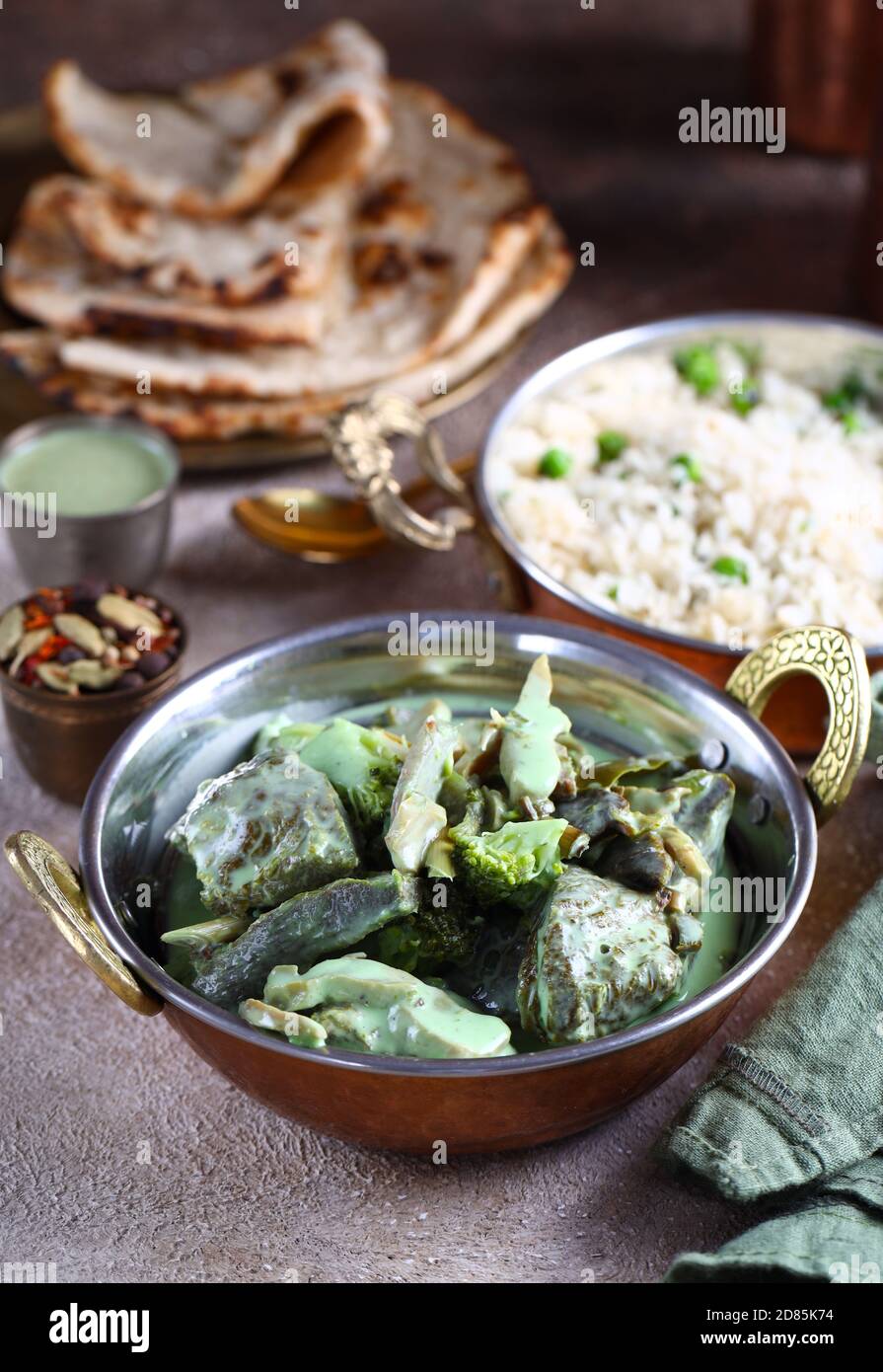 traditional indian food green curry lamb Stock Photo Alamy