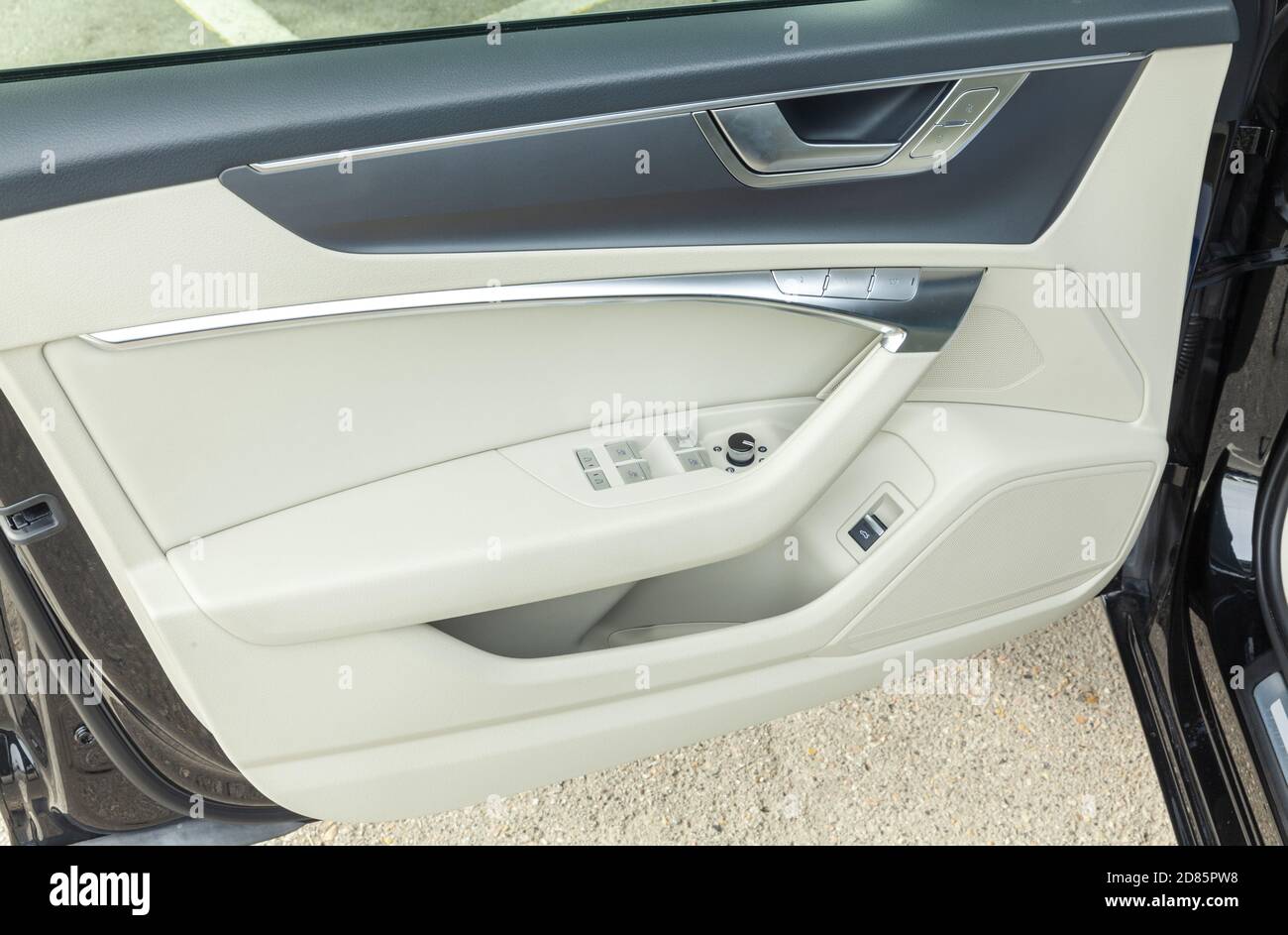 white leather interior on luxory car door, close up Stock Photo
