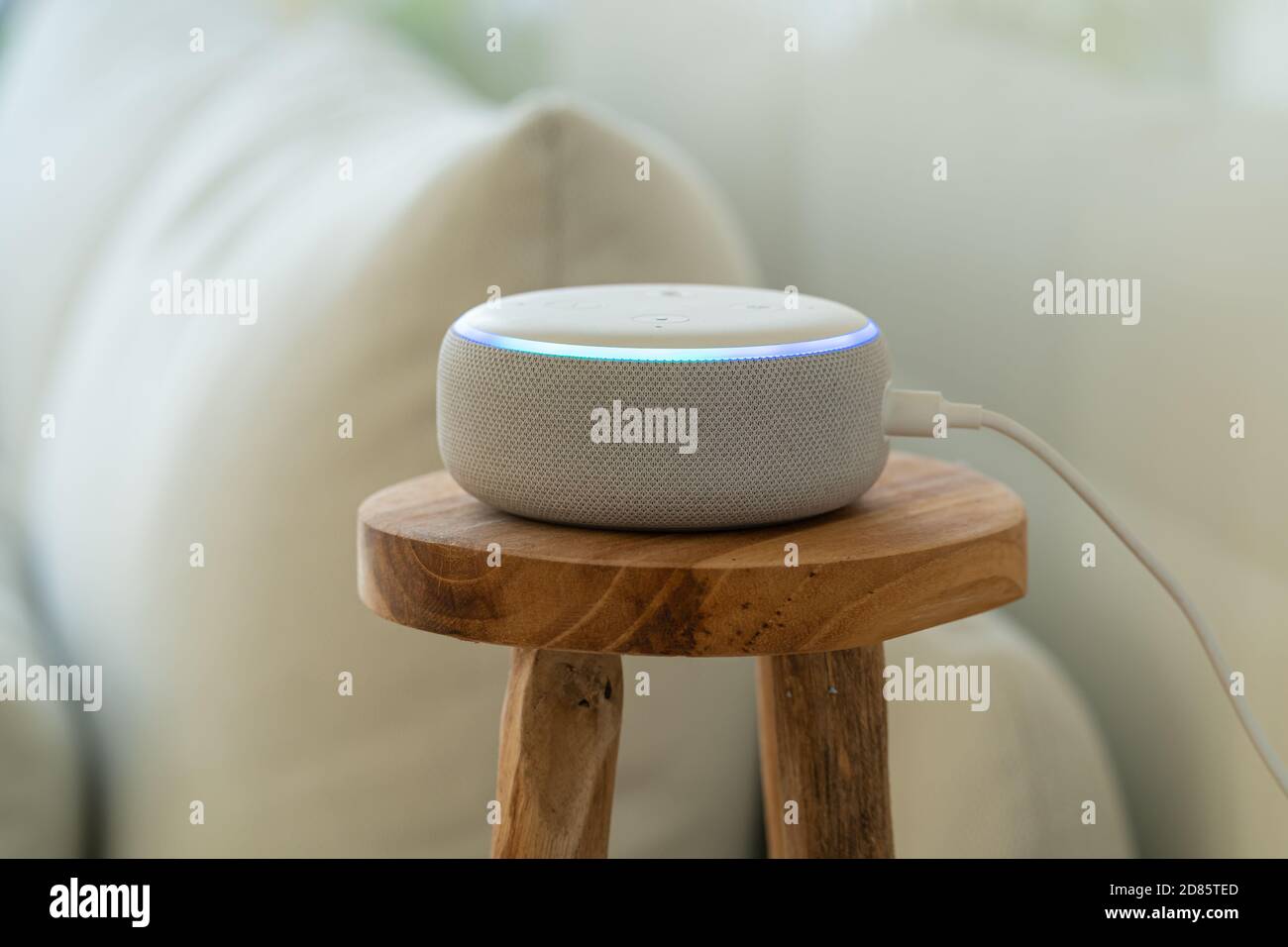 VIENNA,AUSTRIA - October 26 : A white Amazon Alexa Echo on a small wooden  side table with a white sofa in the background Stock Photo - Alamy