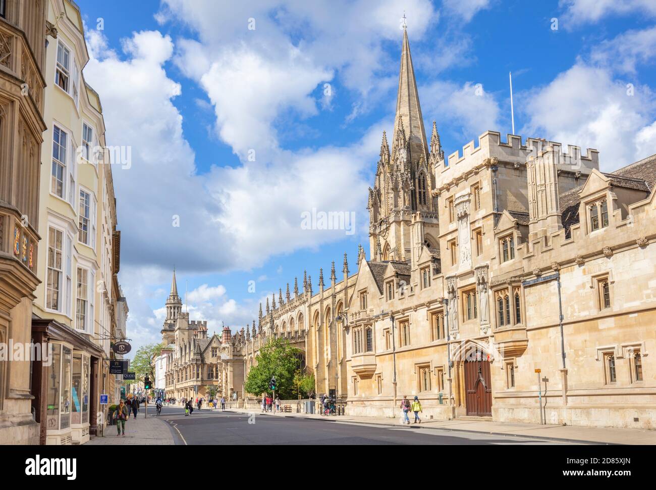 Oxford University entrance to Old Souls College Oxford and  tower of the University Church of St Mary the Virgin Oxford Oxfordshire England UK GB Stock Photo
