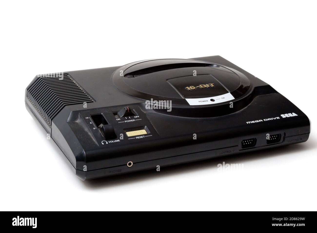 London, United Kingdom, 21st September 2020:- A retro Sega Mega Drive 16-bit gaming console isolated on a white background Stock Photo