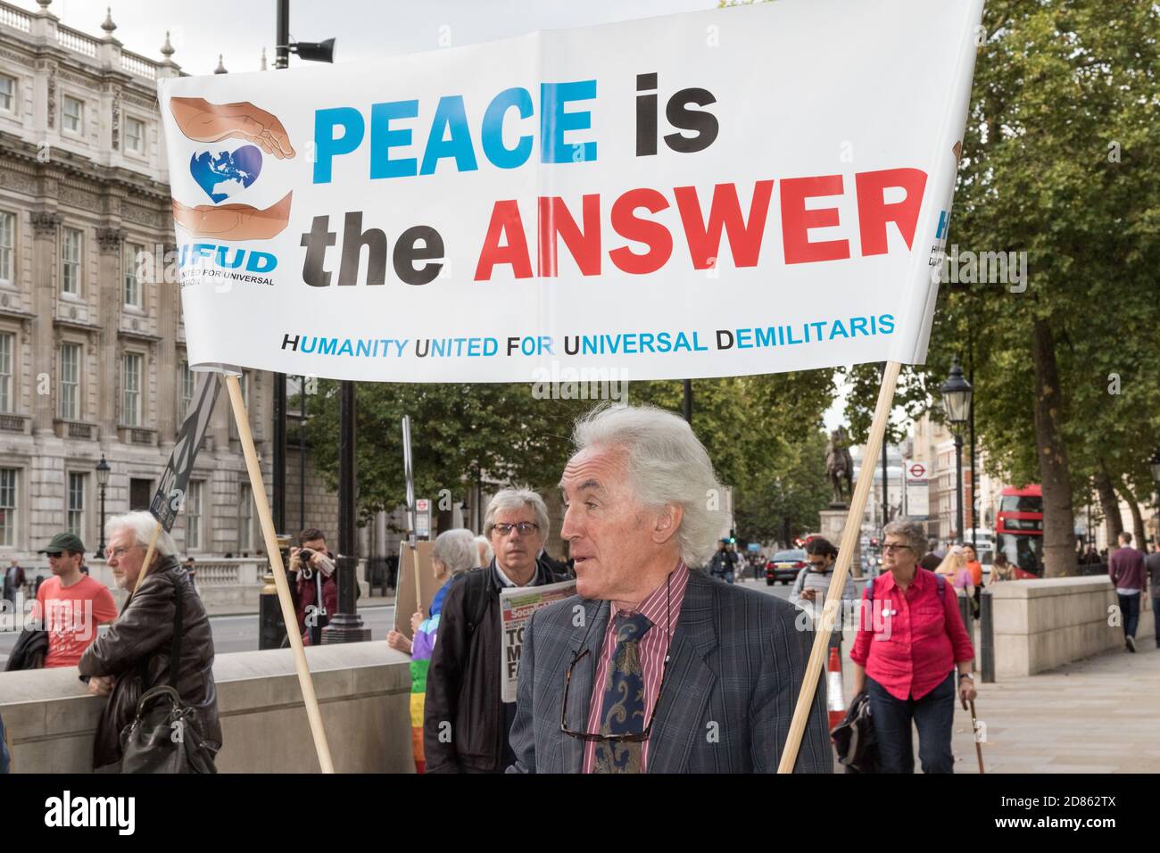 London, 28th September 2017:- Protesters gather in Whitehall, opposite Downing Street, to protest the growing tensions between North Korea and the USA Stock Photo