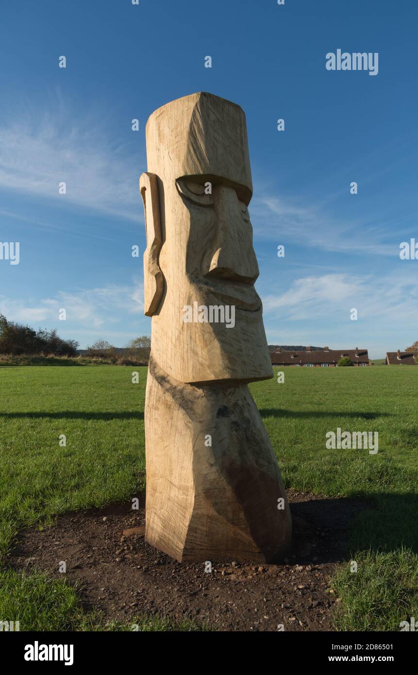 Ring of replica Easter Island carved wooden heads at Jonnos Field, seaside town of Scarbourough