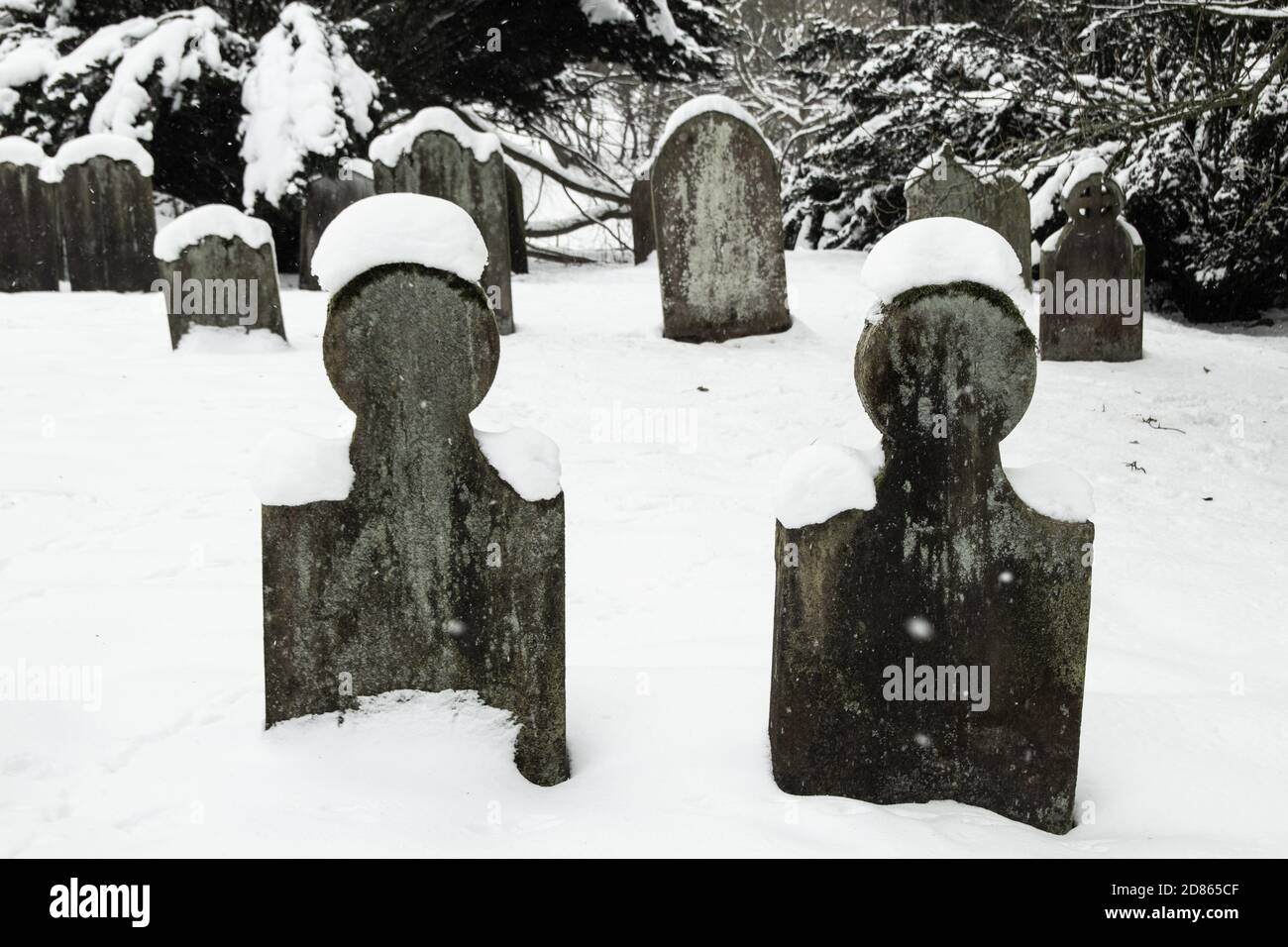 Cemetery covered in snow at Kildale, North Yorkshire Stock Photo
