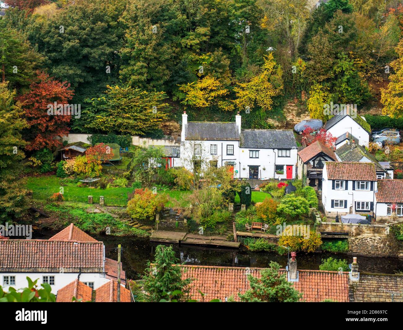 Houses in the Nidd from the crag top above Abbey Road in autumn