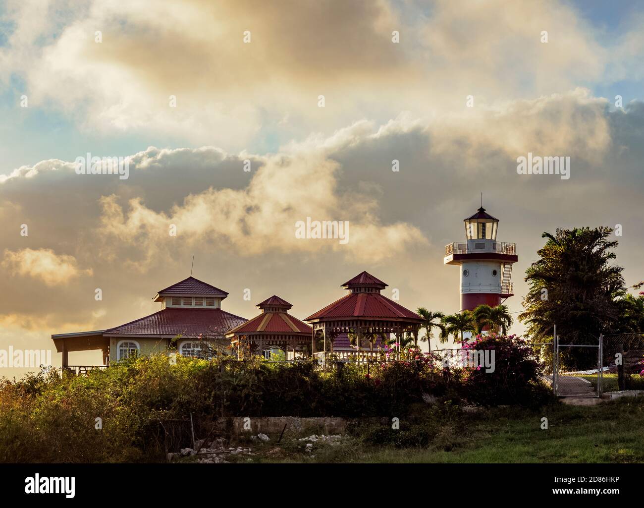 Lovers Leap Restaurant and Lighthouse at sunset, Saint Elizabeth Parish, Jamaica Stock Photo
