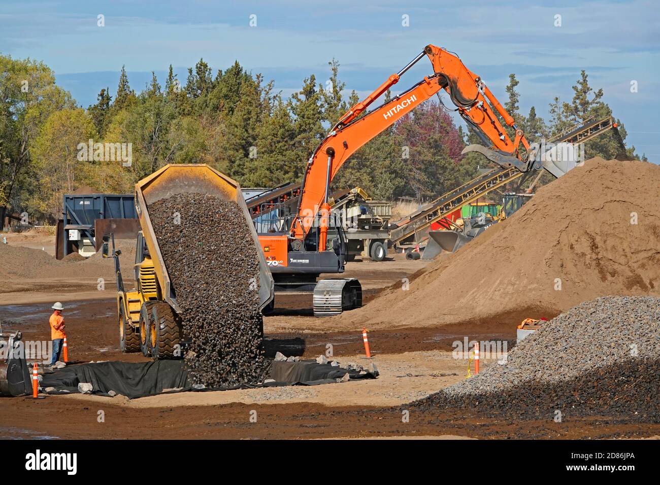 A large, earth moving dump truck on a construction site in Bend, Oregon