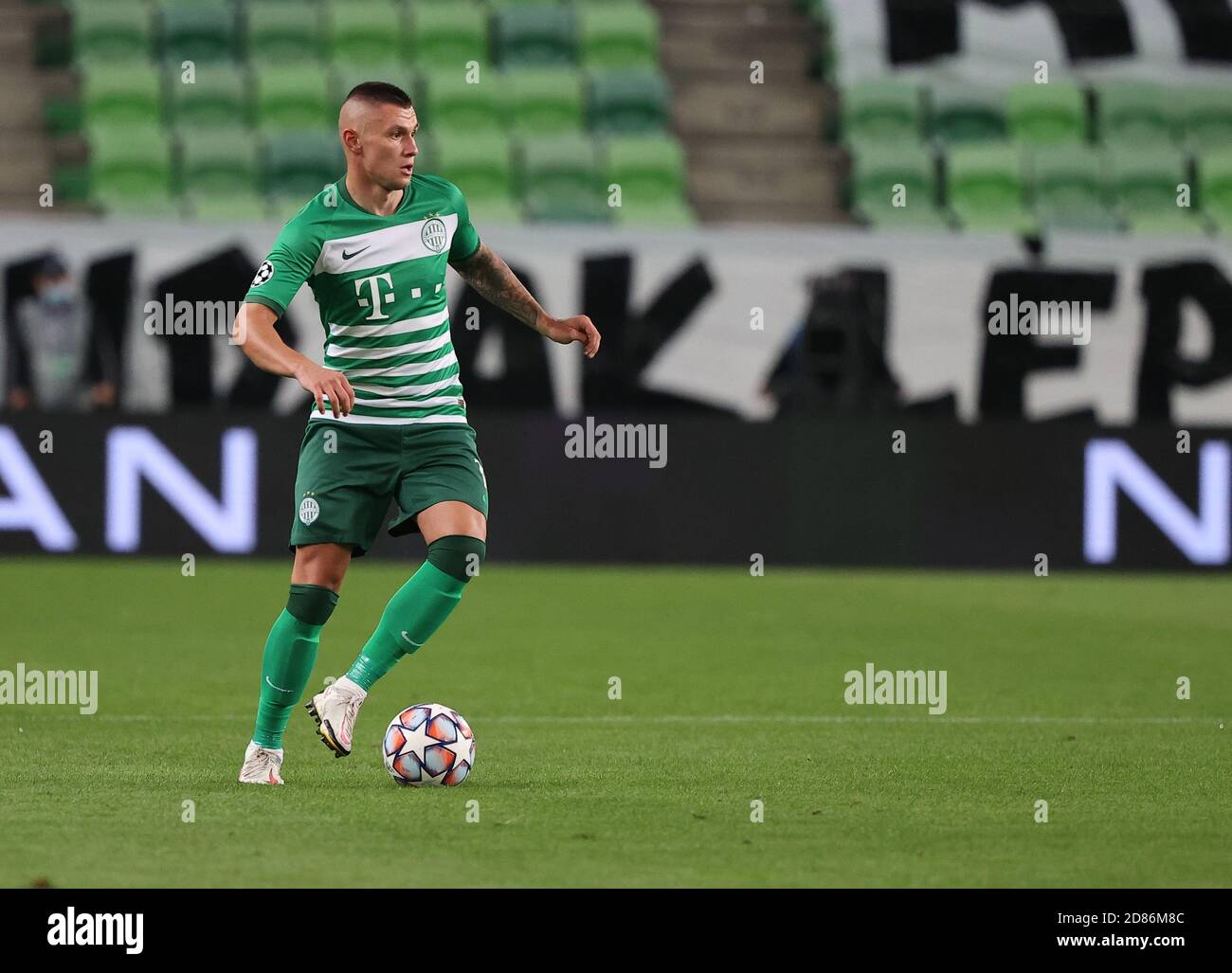 BUDAPEST, HUNGARY - SEPTEMBER 29: Oleksandr Zubkov of Ferencvarosi TC  controls the ball during the UEFA Champions League Play-Offs Second Leg  match between Ferencvarosi TC and Molde FK at Ferencvaros Stadium on