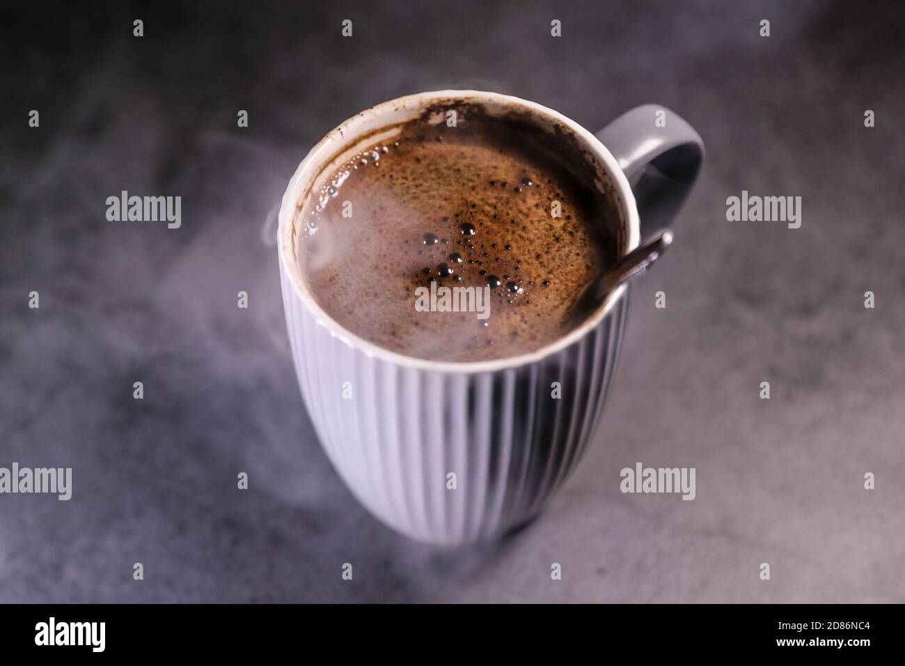 Steamed fresh black coffee cup on a dark table. Morning espresso Stock Photo Alamy
