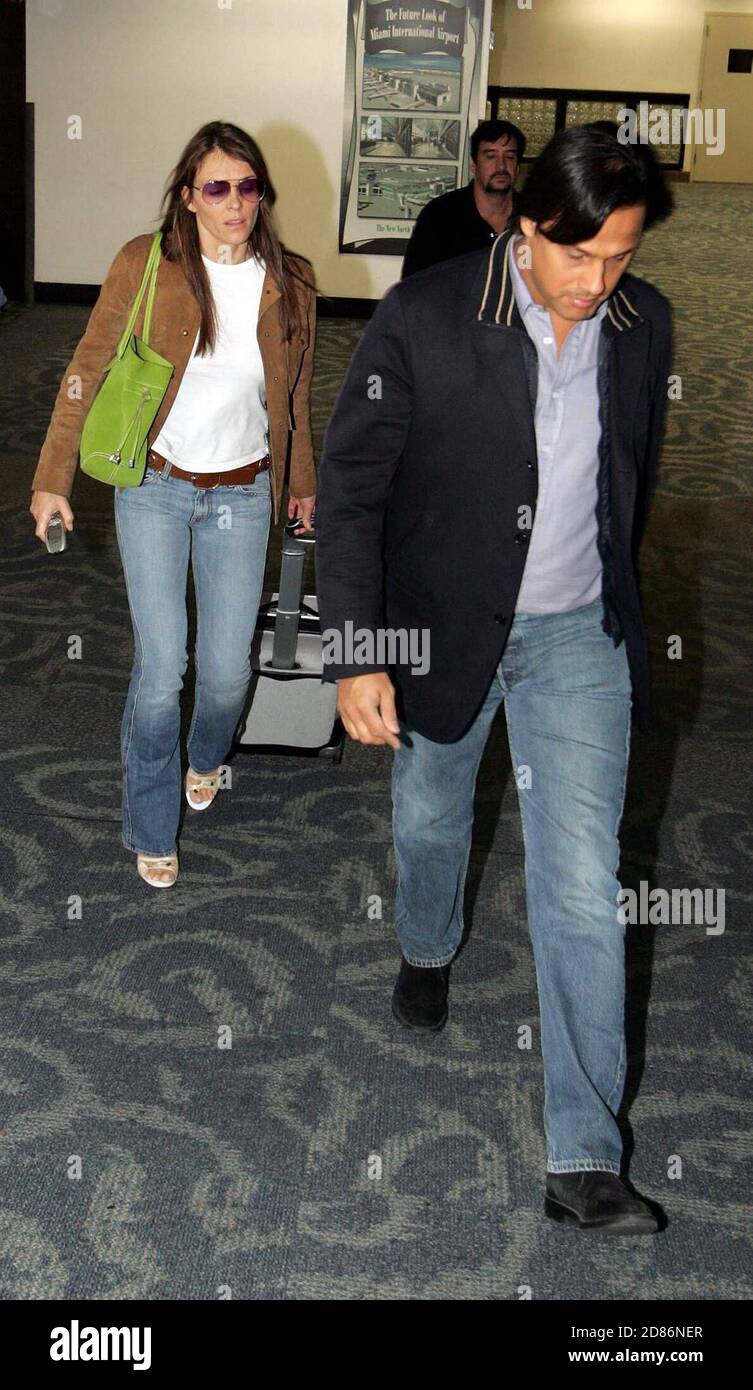Elizabeth Hurley and boyfriend  Arun Nayar arrive at Miami International Airport, 4/25/05 [[cad]] Stock Photo