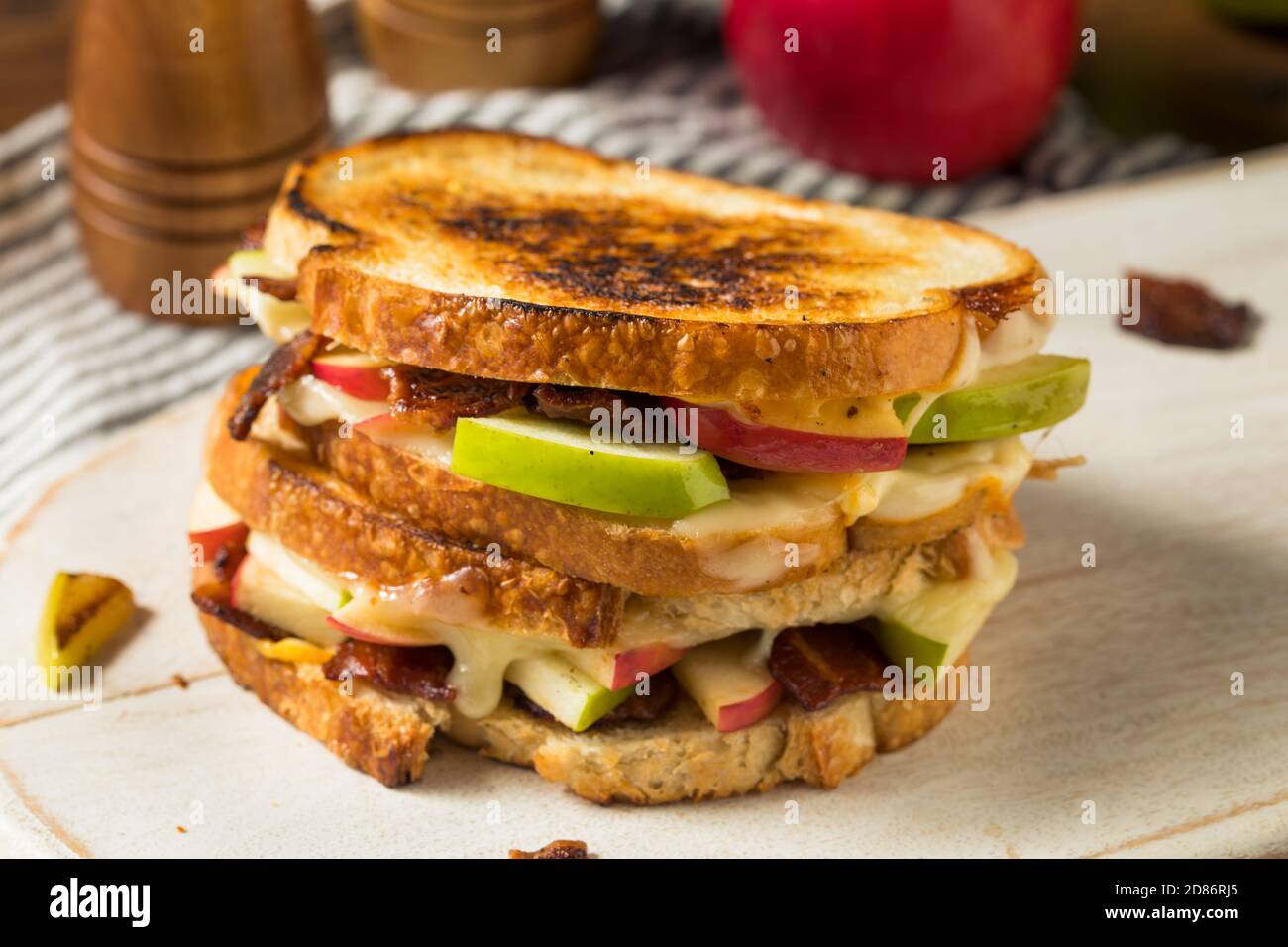 Homemade Bacon Apple Grilled Cheese Panini on White Bread Stock Photo