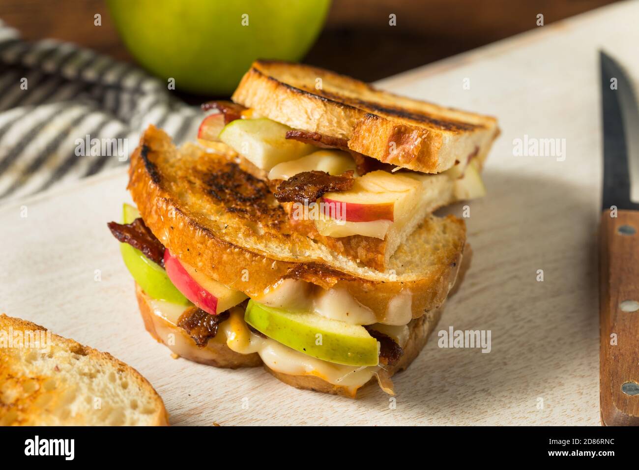 Homemade Bacon Apple Grilled Cheese Panini on White Bread Stock Photo