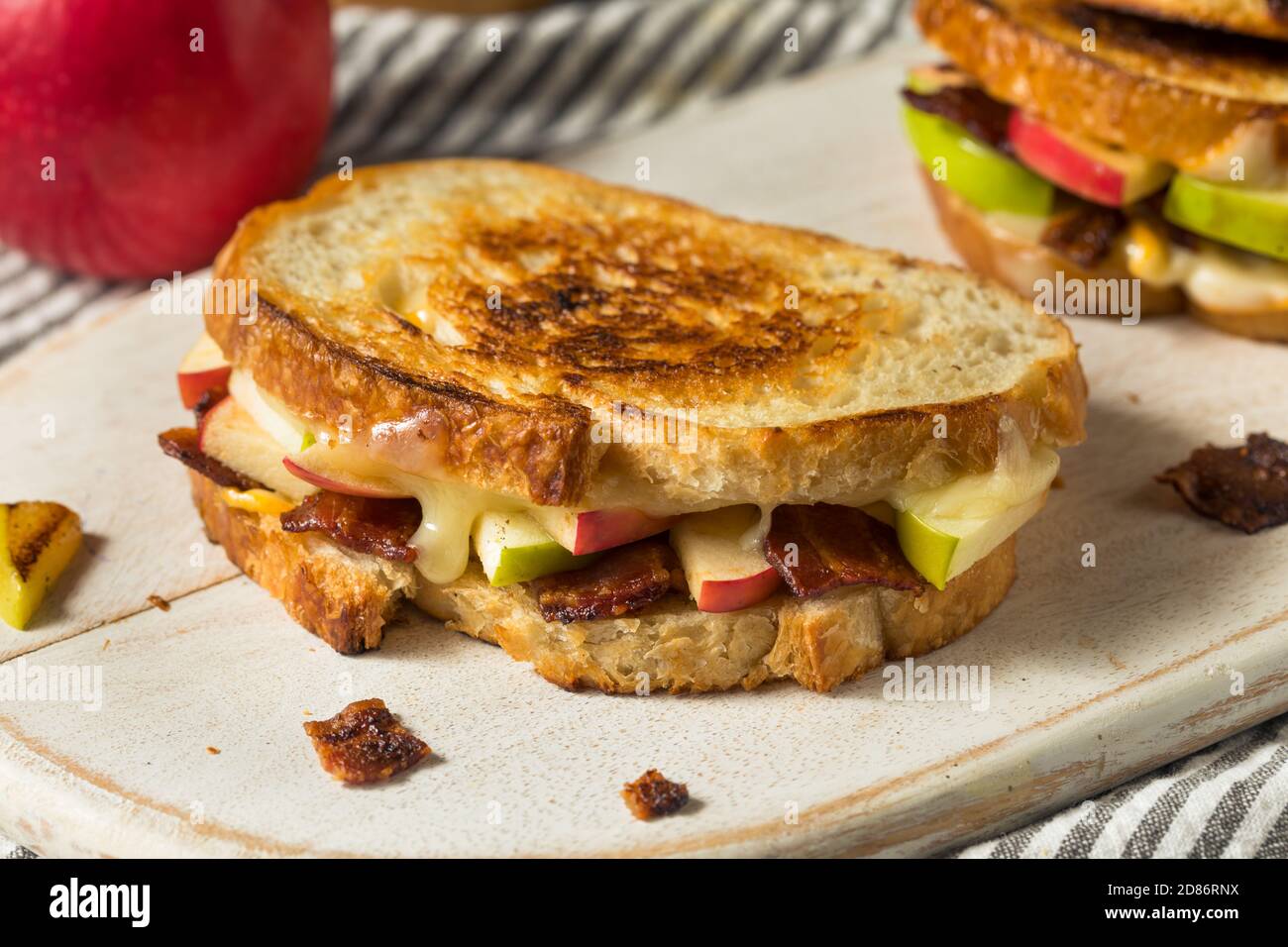 Homemade Bacon Apple Grilled Cheese Panini on White Bread Stock Photo