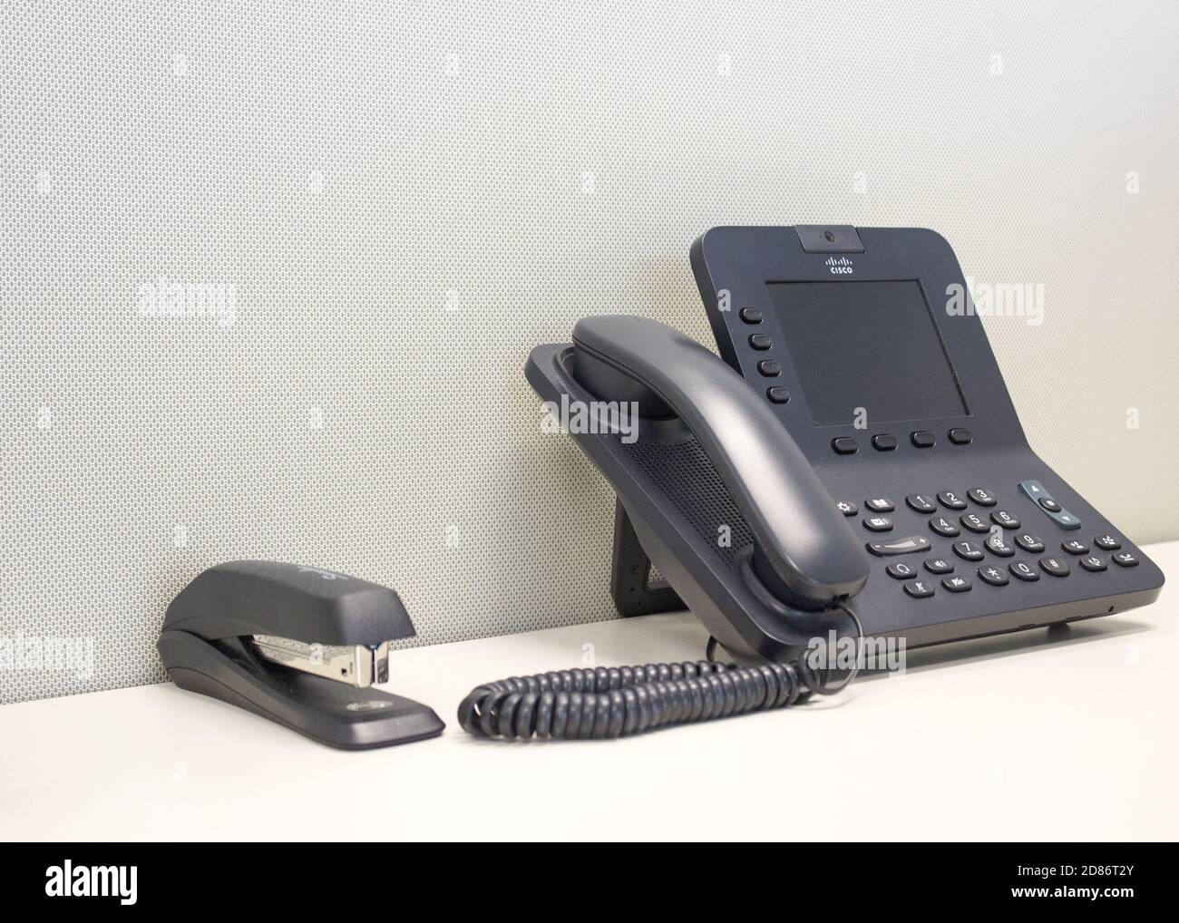 Office phone and stapler Stock Photo
