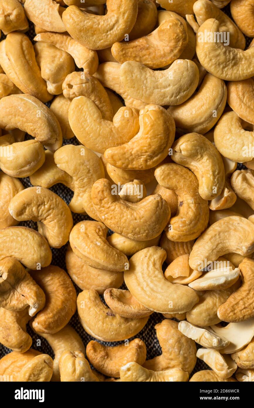 Raw Organic Shelled Cashew Nuts in a Bowl Stock Photo
