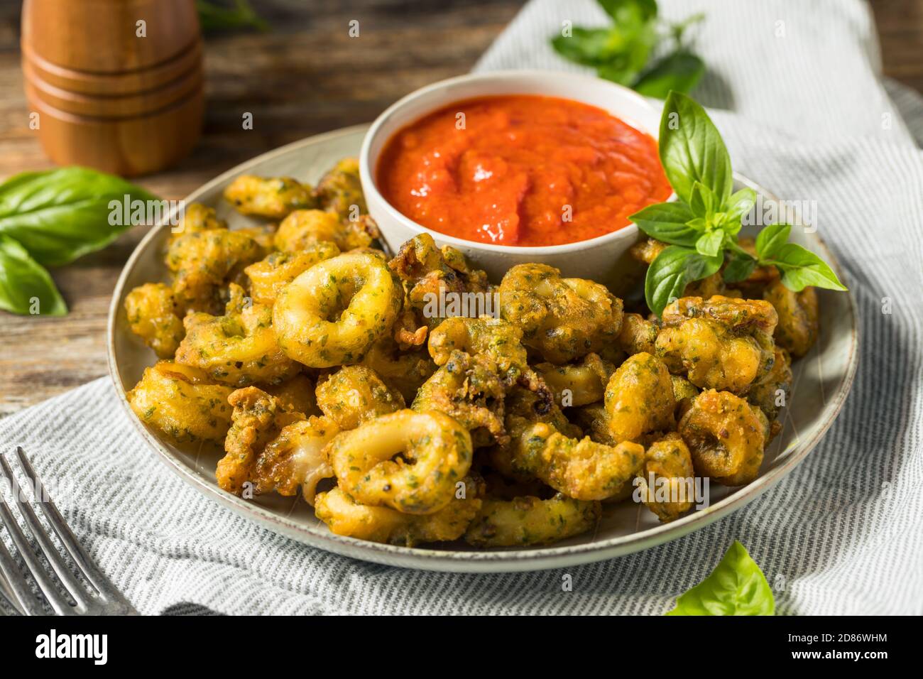 Homemade Deep Fried Calamari Appetizer with Marinara Sauce Stock Photo