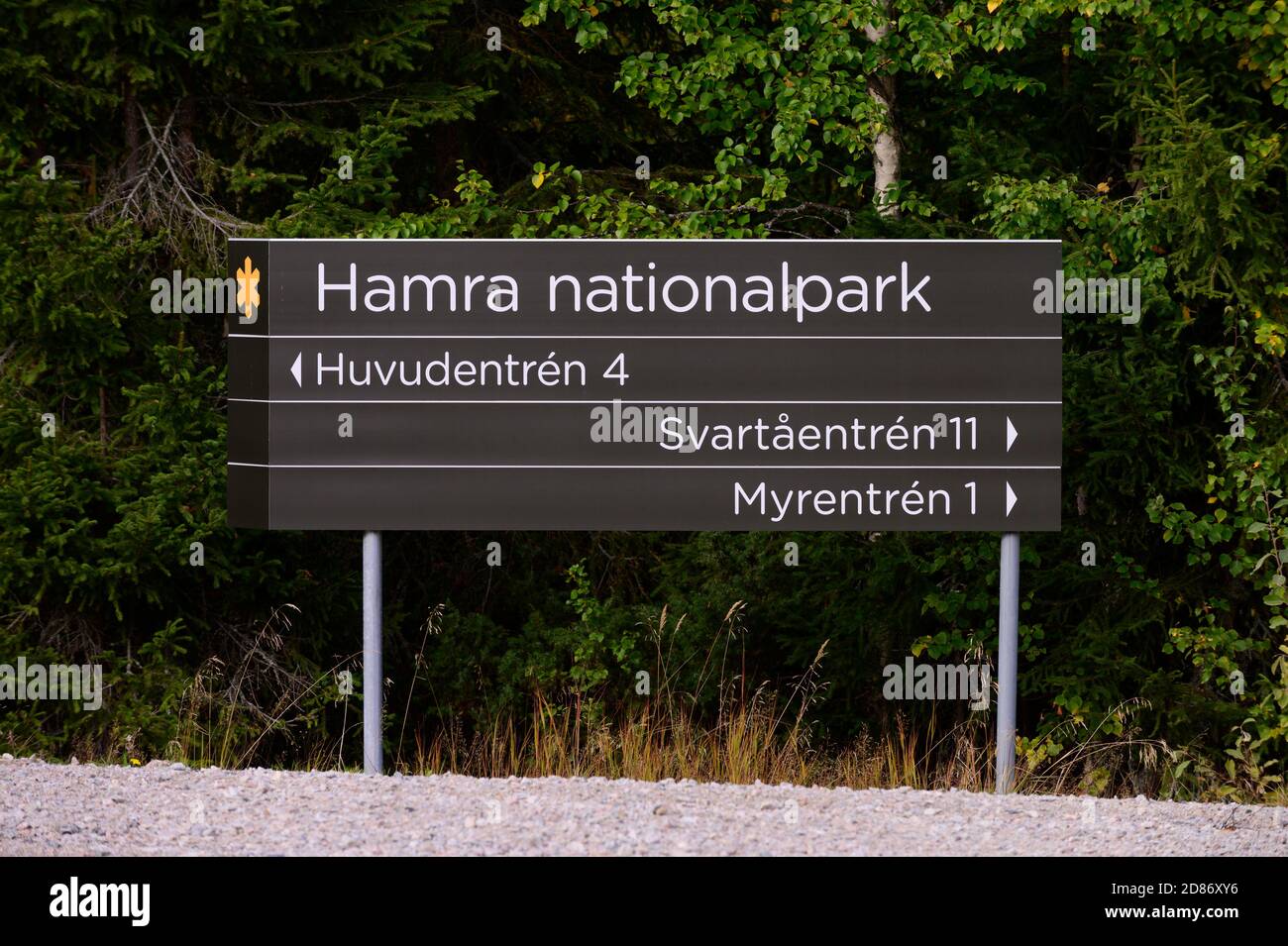 Road sign to the entrances of Hamra National Park, Sweden Stock Photo