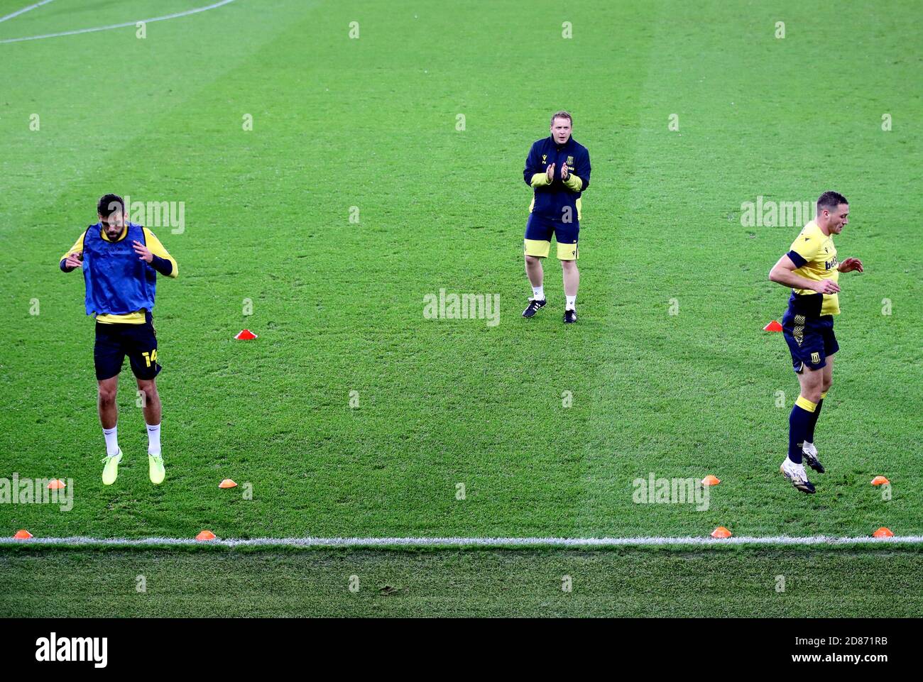 Stoke City's Tommy Smith (left) and teammate James Chester warm up on the pitch prior to the beginning of the Sky Bet Championship match at Liberty Stadium, Swansea. Stock Photo