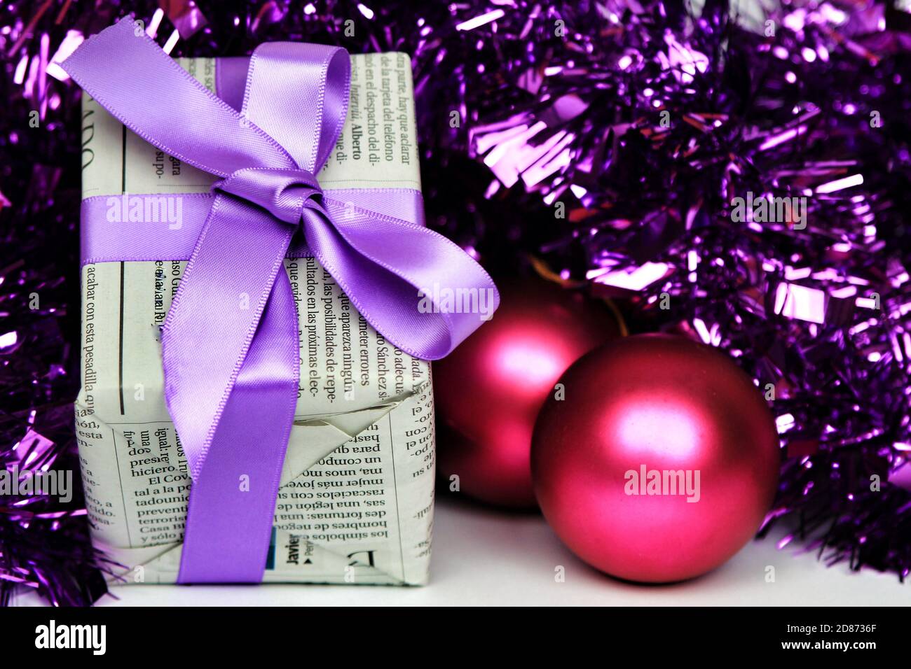 Alicante, Spain October 18, 2020Gifts wrapped in old newspaper with